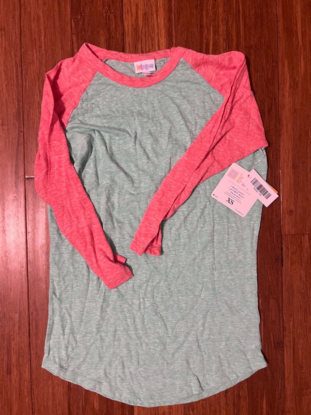 LuLaRoe Randy Mint Green Body with Coral Raglan Long Sleeve Tee